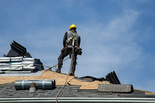 Professional Roofing technician working in Glen Cove, NY